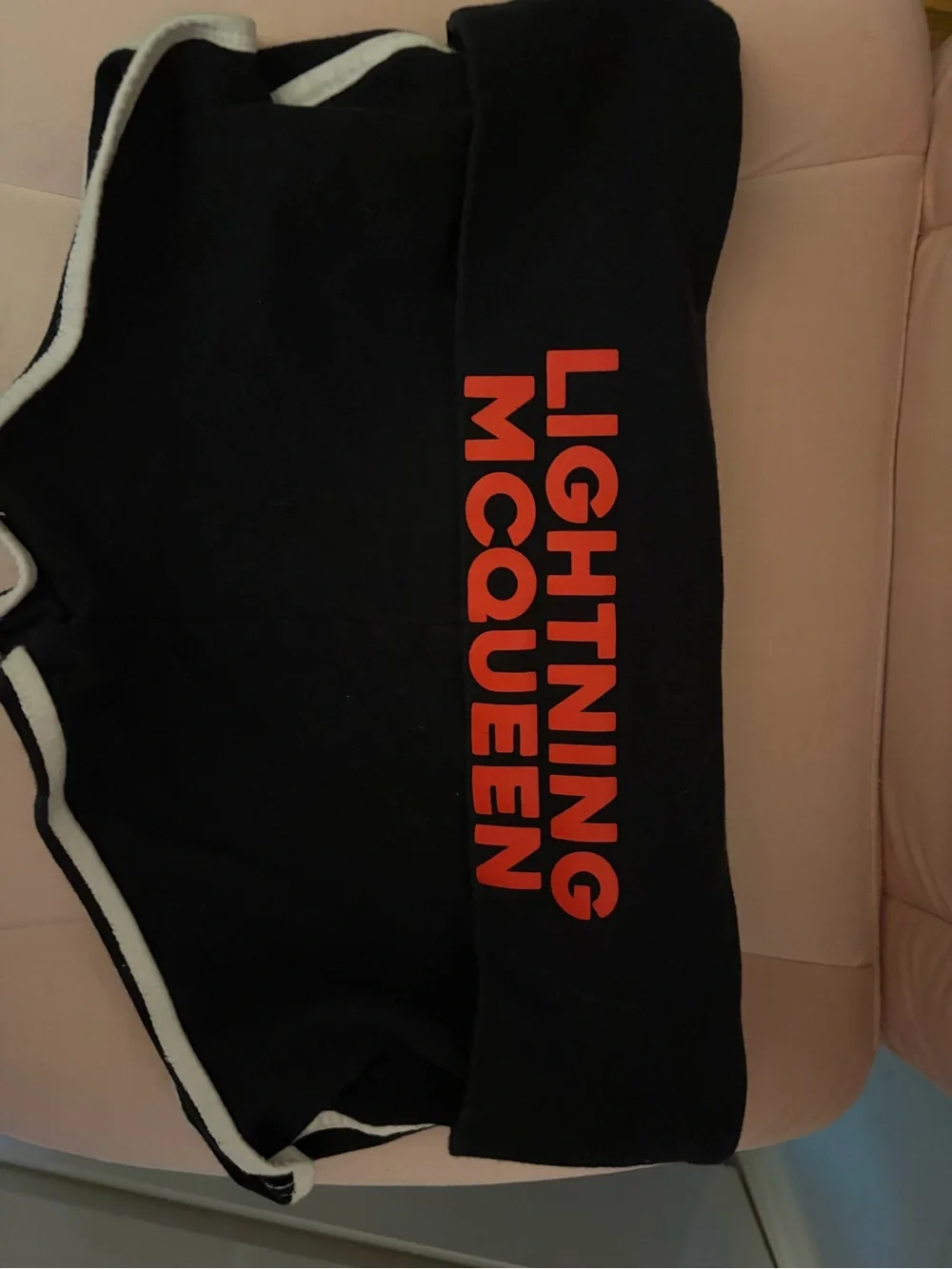 Black fold over Shorts with Red Racing Graphic